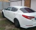 Белый Киа K5, объемом двигателя 2 л и пробегом 230 тыс. км за 10200 $, фото 1 на Automoto.ua