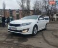 Белый Киа K5, объемом двигателя 2 л и пробегом 216 тыс. км за 10000 $, фото 1 на Automoto.ua