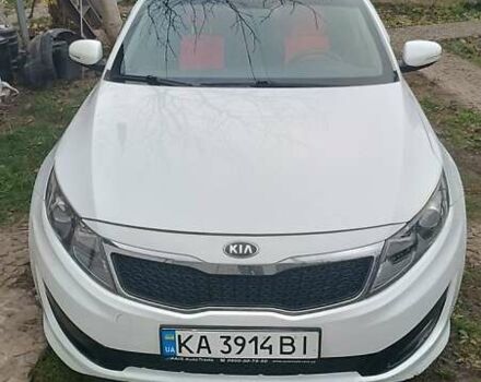 Белый Киа K5, объемом двигателя 2 л и пробегом 230 тыс. км за 10200 $, фото 2 на Automoto.ua