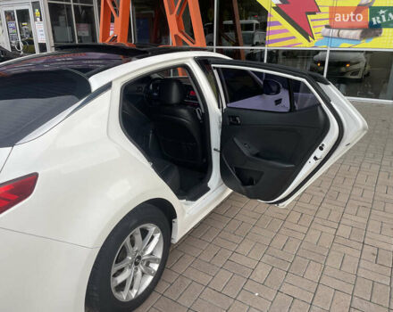 Белый Киа K5, объемом двигателя 2 л и пробегом 239 тыс. км за 10400 $, фото 7 на Automoto.ua