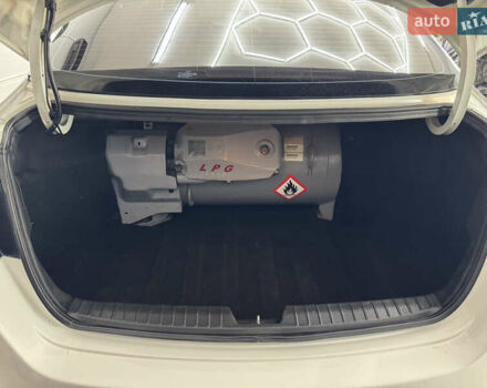 Білий Кіа K5, об'ємом двигуна 2 л та пробігом 260 тис. км за 8499 $, фото 24 на Automoto.ua