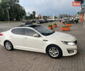 Белый Киа K5, объемом двигателя 2 л и пробегом 239 тыс. км за 10400 $, фото 1 на Automoto.ua