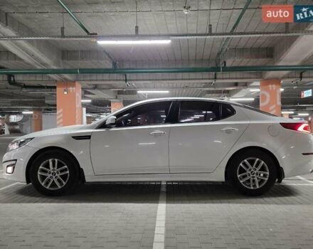Белый Киа K5, объемом двигателя 2 л и пробегом 189 тыс. км за 7222 $, фото 1 на Automoto.ua