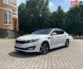Білий Кіа K5, об'ємом двигуна 2 л та пробігом 165 тис. км за 8000 $, фото 1 на Automoto.ua