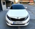 Белый Киа K5, объемом двигателя 2 л и пробегом 273 тыс. км за 10600 $, фото 1 на Automoto.ua