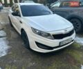 Белый Киа K5, объемом двигателя 2 л и пробегом 170 тыс. км за 7000 $, фото 1 на Automoto.ua