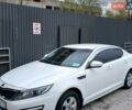 Белый Киа K5, объемом двигателя 2 л и пробегом 265 тыс. км за 9500 $, фото 1 на Automoto.ua