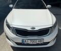Белый Киа K5, объемом двигателя 2 л и пробегом 223 тыс. км за 10000 $, фото 1 на Automoto.ua