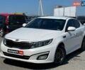 Белый Киа K5, объемом двигателя 2 л и пробегом 246 тыс. км за 10240 $, фото 1 на Automoto.ua