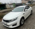 Белый Киа K5, объемом двигателя 2 л и пробегом 295 тыс. км за 7900 $, фото 1 на Automoto.ua