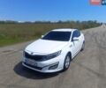 Белый Киа K5, объемом двигателя 2 л и пробегом 280 тыс. км за 11500 $, фото 1 на Automoto.ua