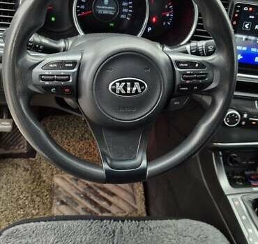 Белый Киа K5, объемом двигателя 2 л и пробегом 229 тыс. км за 9500 $, фото 7 на Automoto.ua