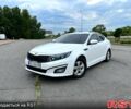 Белый Киа K5, объемом двигателя 2 л и пробегом 213 тыс. км за 10400 $, фото 1 на Automoto.ua