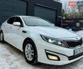 Белый Киа K5, объемом двигателя 2 л и пробегом 245 тыс. км за 11500 $, фото 1 на Automoto.ua