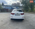 Белый Киа K5, объемом двигателя 2 л и пробегом 296 тыс. км за 12000 $, фото 5 на Automoto.ua