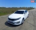 Белый Киа K5, объемом двигателя 2 л и пробегом 283 тыс. км за 9500 $, фото 1 на Automoto.ua