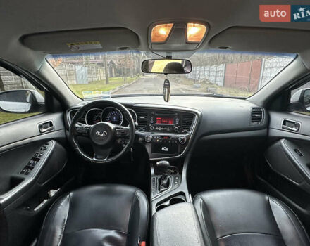 Белый Киа K5, объемом двигателя 2 л и пробегом 247 тыс. км за 7699 $, фото 11 на Automoto.ua