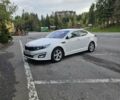 Білий Кіа K5, об'ємом двигуна 2 л та пробігом 216 тис. км за 10999 $, фото 1 на Automoto.ua