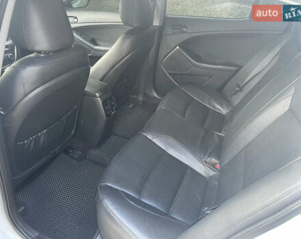 Белый Киа K5, объемом двигателя 2 л и пробегом 296 тыс. км за 12000 $, фото 14 на Automoto.ua