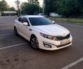 Белый Киа K5, объемом двигателя 2 л и пробегом 340 тыс. км за 8300 $, фото 1 на Automoto.ua