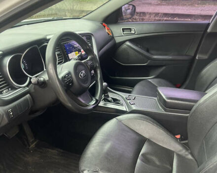 Белый Киа K5, объемом двигателя 2 л и пробегом 295 тыс. км за 7900 $, фото 9 на Automoto.ua