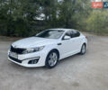 Белый Киа K5, объемом двигателя 2 л и пробегом 296 тыс. км за 12000 $, фото 1 на Automoto.ua