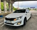 Белый Киа K5, объемом двигателя 2 л и пробегом 333 тыс. км за 8500 $, фото 1 на Automoto.ua