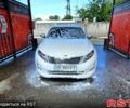 Белый Киа K5, объемом двигателя 2 л и пробегом 378 тыс. км за 9000 $, фото 1 на Automoto.ua