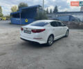 Белый Киа K5, объемом двигателя 2 л и пробегом 296 тыс. км за 12000 $, фото 4 на Automoto.ua