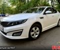 Белый Киа K5, объемом двигателя 2 л и пробегом 204 тыс. км за 11000 $, фото 1 на Automoto.ua