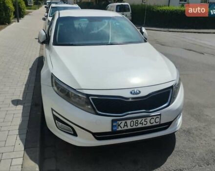 Белый Киа K5, объемом двигателя 2 л и пробегом 250 тыс. км за 10600 $, фото 1 на Automoto.ua