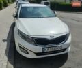 Белый Киа K5, объемом двигателя 2 л и пробегом 250 тыс. км за 10600 $, фото 1 на Automoto.ua