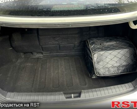 Білий Кіа K5, об'ємом двигуна 2 л та пробігом 266 тис. км за 9900 $, фото 4 на Automoto.ua