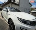Белый Киа K5, объемом двигателя 2 л и пробегом 245 тыс. км за 8500 $, фото 1 на Automoto.ua