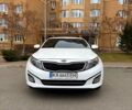 Белый Киа K5, объемом двигателя 2 л и пробегом 346 тыс. км за 11500 $, фото 1 на Automoto.ua