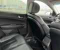 Белый Киа K5, объемом двигателя 2 л и пробегом 378 тыс. км за 9000 $, фото 6 на Automoto.ua