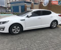 Белый Киа K5, объемом двигателя 2 л и пробегом 245 тыс. км за 11500 $, фото 1 на Automoto.ua