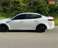 Белый Киа K5, объемом двигателя 2 л и пробегом 240 тыс. км за 10900 $, фото 8 на Automoto.ua