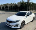 Белый Киа K5, объемом двигателя 2 л и пробегом 168 тыс. км за 10200 $, фото 1 на Automoto.ua