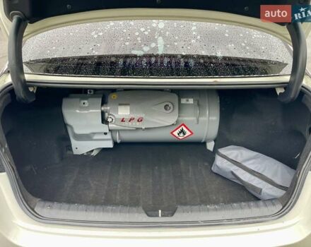 Белый Киа K5, объемом двигателя 2 л и пробегом 272 тыс. км за 12200 $, фото 7 на Automoto.ua