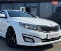 Белый Киа K5, объемом двигателя 2 л и пробегом 240 тыс. км за 9990 $, фото 1 на Automoto.ua