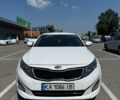 Белый Киа K5, объемом двигателя 2 л и пробегом 250 тыс. км за 9200 $, фото 1 на Automoto.ua