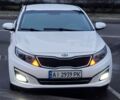 Белый Киа K5, объемом двигателя 2 л и пробегом 258 тыс. км за 7999 $, фото 1 на Automoto.ua