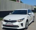 Белый Киа K5, объемом двигателя 2 л и пробегом 276 тыс. км за 9900 $, фото 1 на Automoto.ua