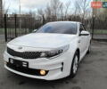 Белый Киа K5, объемом двигателя 2 л и пробегом 252 тыс. км за 11750 $, фото 1 на Automoto.ua