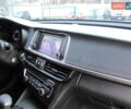 Белый Киа K5, объемом двигателя 2 л и пробегом 252 тыс. км за 11750 $, фото 50 на Automoto.ua