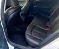 Белый Киа K5, объемом двигателя 2 л и пробегом 225 тыс. км за 11999 $, фото 7 на Automoto.ua