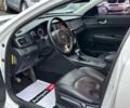 Белый Киа K5, объемом двигателя 2 л и пробегом 229 тыс. км за 13390 $, фото 3 на Automoto.ua