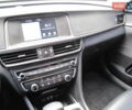 Белый Киа K5, объемом двигателя 2 л и пробегом 253 тыс. км за 12900 $, фото 78 на Automoto.ua