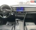 Белый Киа K5, объемом двигателя 2 л и пробегом 397 тыс. км за 10990 $, фото 4 на Automoto.ua
